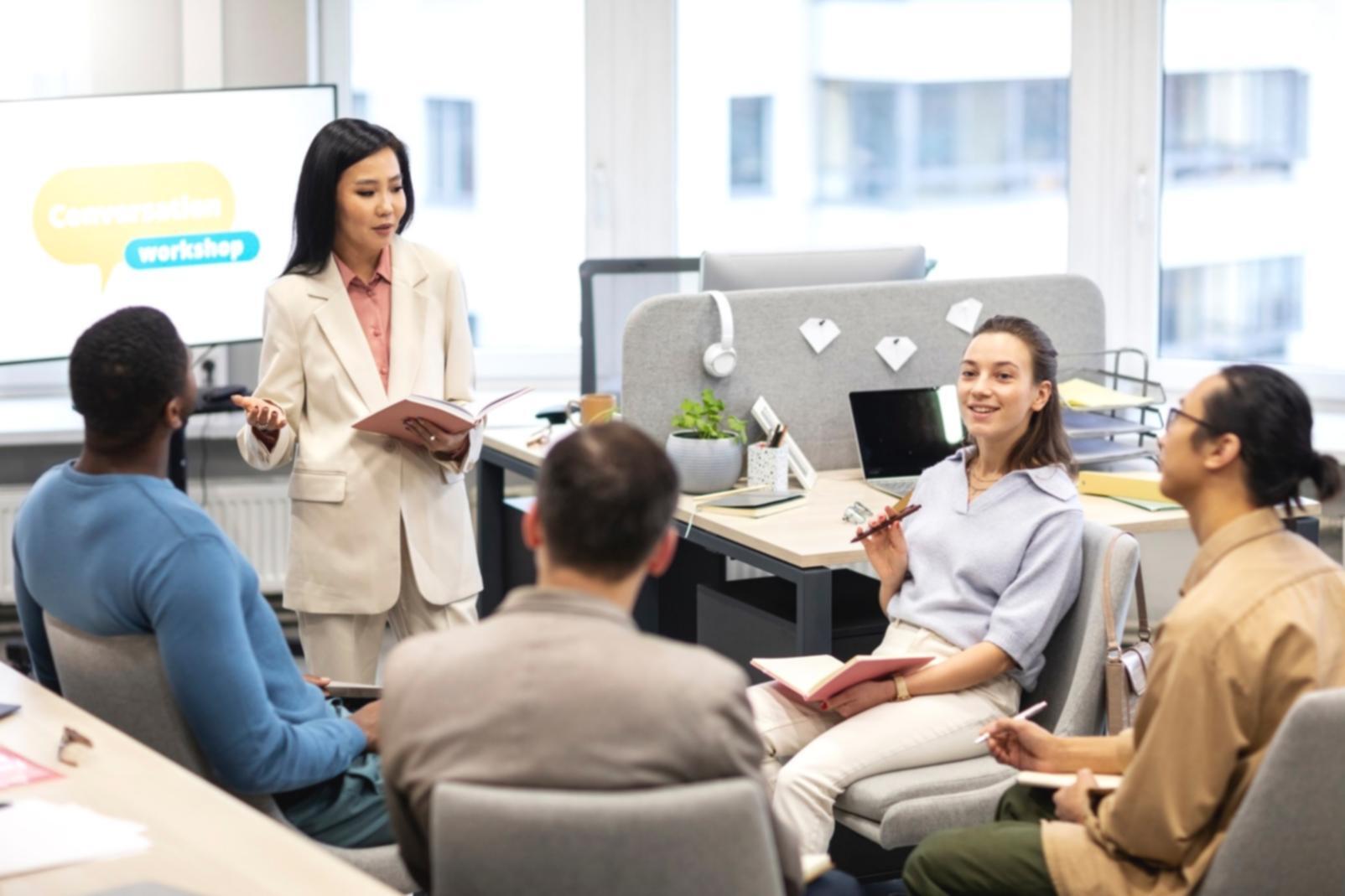 Professional business meeting with strategic planning documents